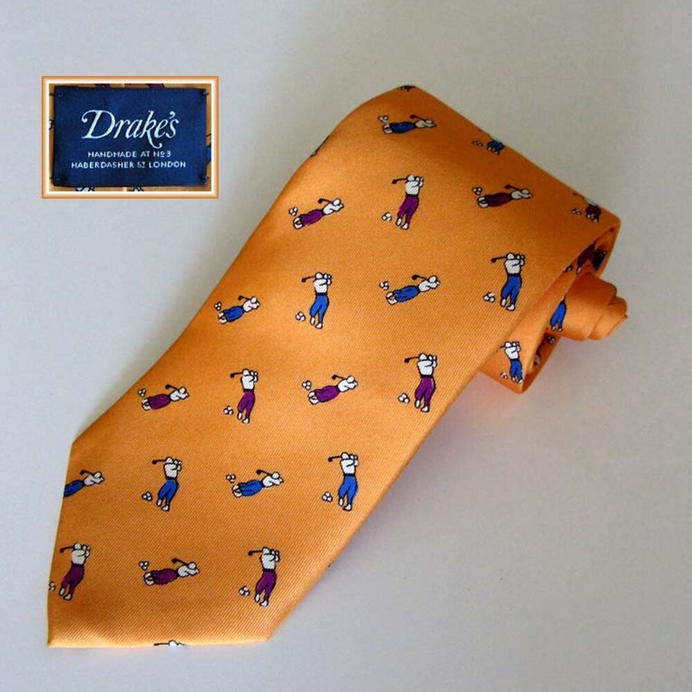 Drake's orange golf pattern neck tie handmade England 100% silk